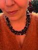 Collier noir multi doré