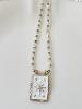 collier médaillon blanc étoile doré