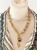 Collier Ame beige doré