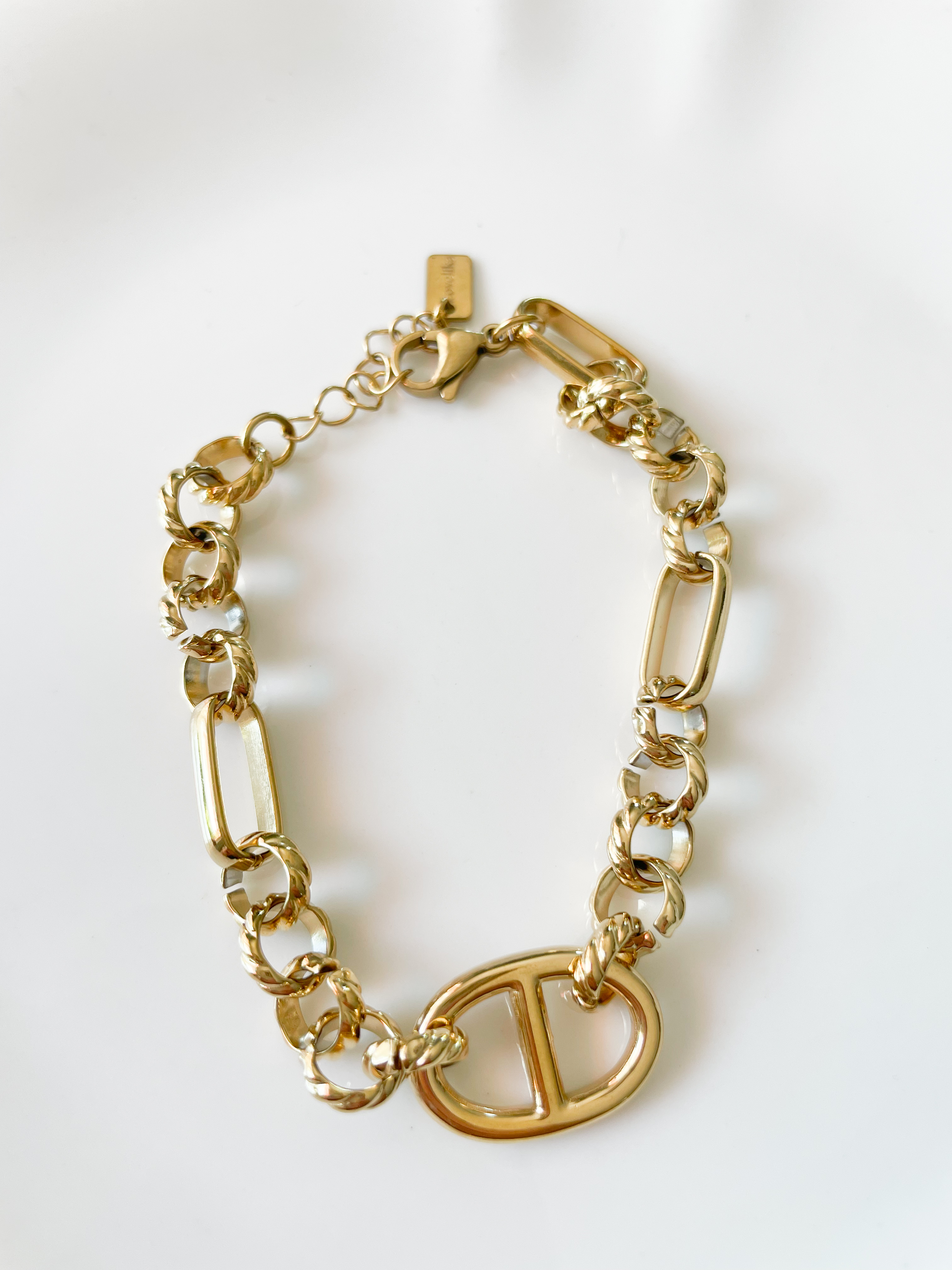 Bracelet maillons torsadé doré 