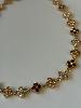 Collier petites fleurs strass marron doré