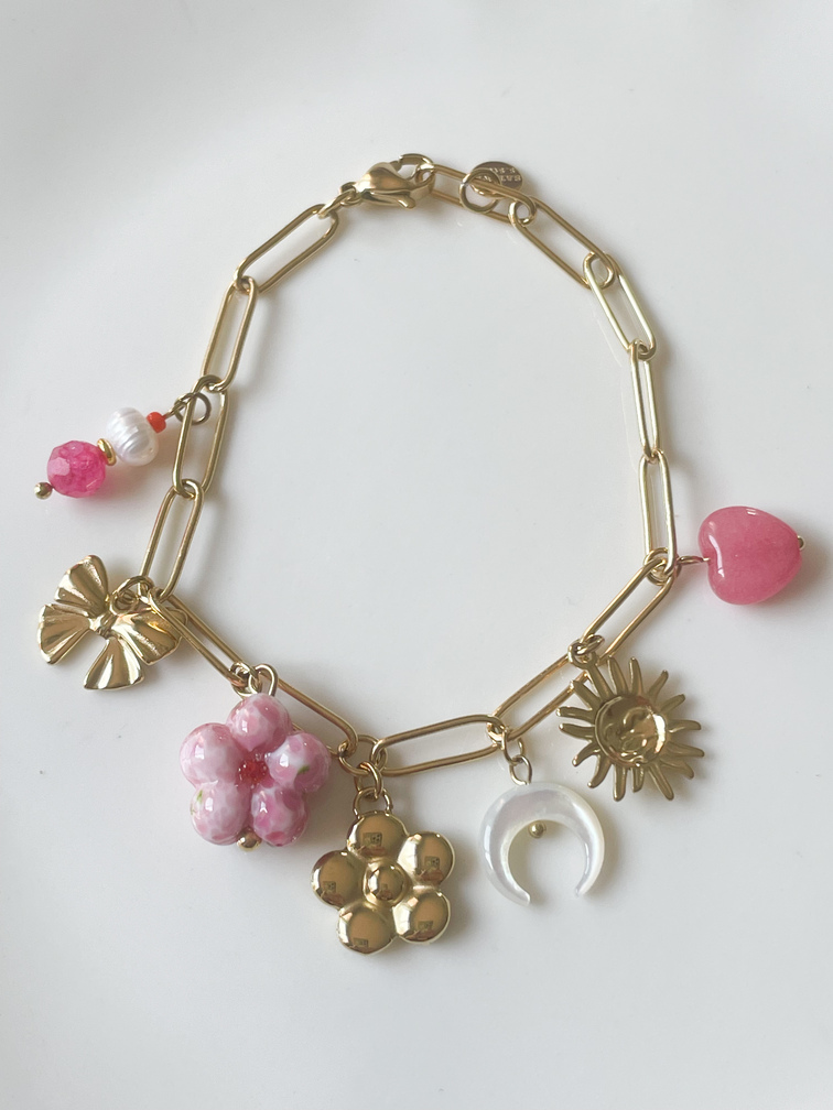 Bracelet breloques fleurs roses doré