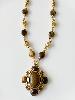Collier pierre marron doré