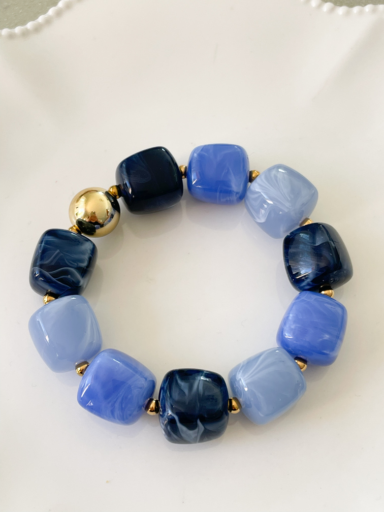 Bracelet perles bleues doré du Live