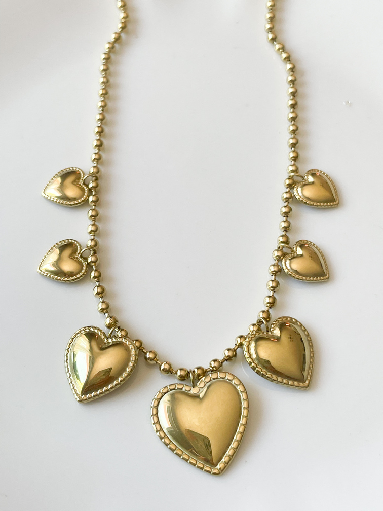 Collier médaillon coeur doré
