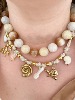 collier coquillage doré