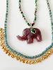 Collier éléphant pierres bordeaux doré