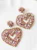 Boucles coeur rose de Mandalita