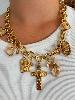 Collier breloques cristal doré 