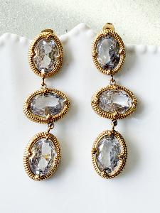 Boucles strass blancs long doré