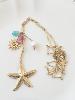 collier sautoir étoile de mer doré