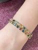 Bracelet jonc pierres multi Mina doré