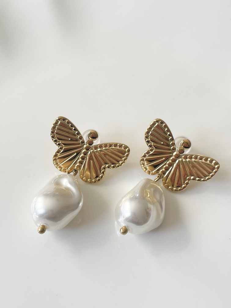 boucles papillon blanc doré