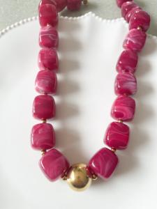 collier perles roses doré