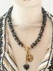 Collier Ame noir doré