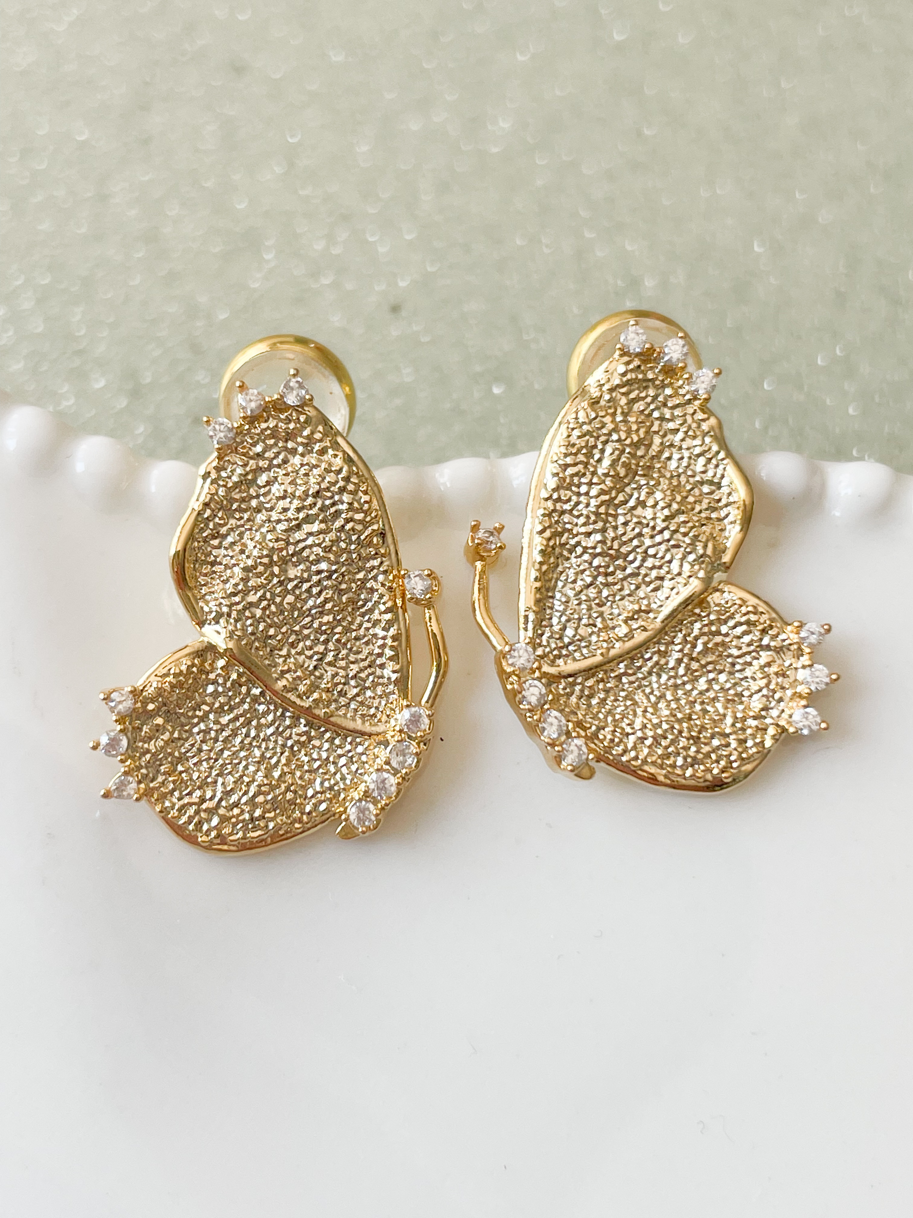 boucles papillon strass doré