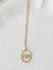 Collier oiseau doré