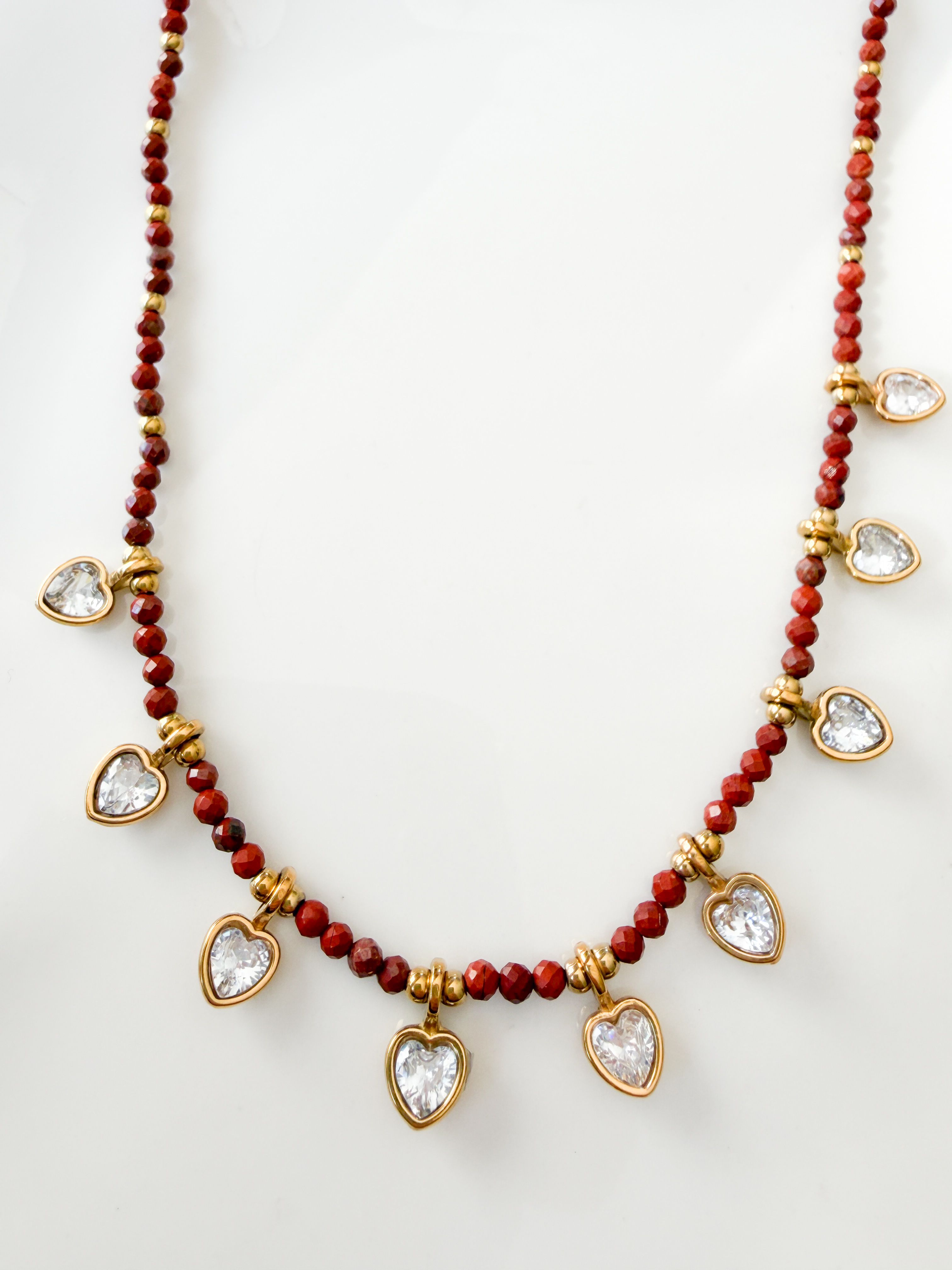 Collier pierres coeurs marron strass doré