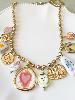 Collier breloques coeur ex voto doré