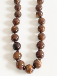 Collier perles marron doré