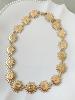 Collier soleil doré