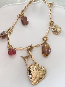 Collier colibri coeur marron doré